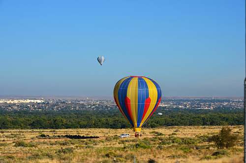 balloon two hot air balloons over beige land albuquerque